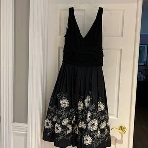 Beautiful dress, worn once black and white/cream. Bottom is like a Tafeta vibe